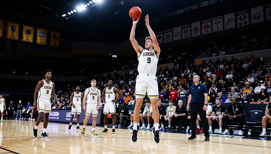 A dynamic basketball court scene featuring standout player Thomas Haugh in action, wearing a college basketball uniform. In the foreground, he is seen executing a powerful jump shot, showcasing his athleticism, focus, and skill. The middle ground captures teammates and a coach analyzing his play, their expressions a mix of admiration and determination. The background displays an energized crowd in a well-lit arena, emphasizing the excitement of the game, with banners and team colors creating a vibrant atmosphere. The scene is illuminated by bright overhead lights, casting dramatic shadows that enhance the sense of movement. The angle is low, emphasizing Haugh’s height and impressive technique, conveying a feeling of intensity and optimism about his potential. A dynamic basketball court scene featuring standout player Thomas Haugh in action, wearing a college basketball uniform. In the foreground, he is seen executing a powerful jump shot, showcasing his athleticism, focus, and skill. The middle ground captures teammates and a coach analyzing his play, their expressions a mix of admiration and determination. The background displays an energized crowd in a well-lit arena, emphasizing the excitement of the game, with banners and team colors creating a vibrant atmosphere. The scene is illuminated by bright overhead lights, casting dramatic shadows that enhance the sense of movement. The angle is low, emphasizing Haugh’s height and impressive technique, conveying a feeling of intensity and optimism about his potential.